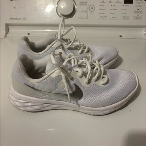 White Nike tennis shoes